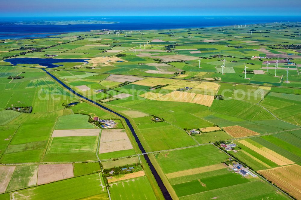 Aerial image Langenhorn - Agricultural land and field boundaries surround the settlement area of the village in Langenhorn in the state Schleswig-Holstein, Germany