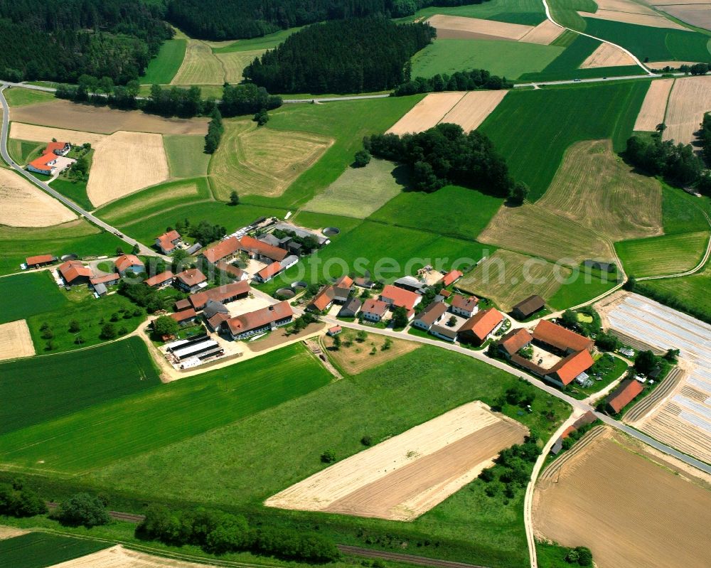 Aerial photograph Langenkatzbach - Agricultural land and field boundaries surround the settlement area of the village in Langenkatzbach in the state Bavaria, Germany