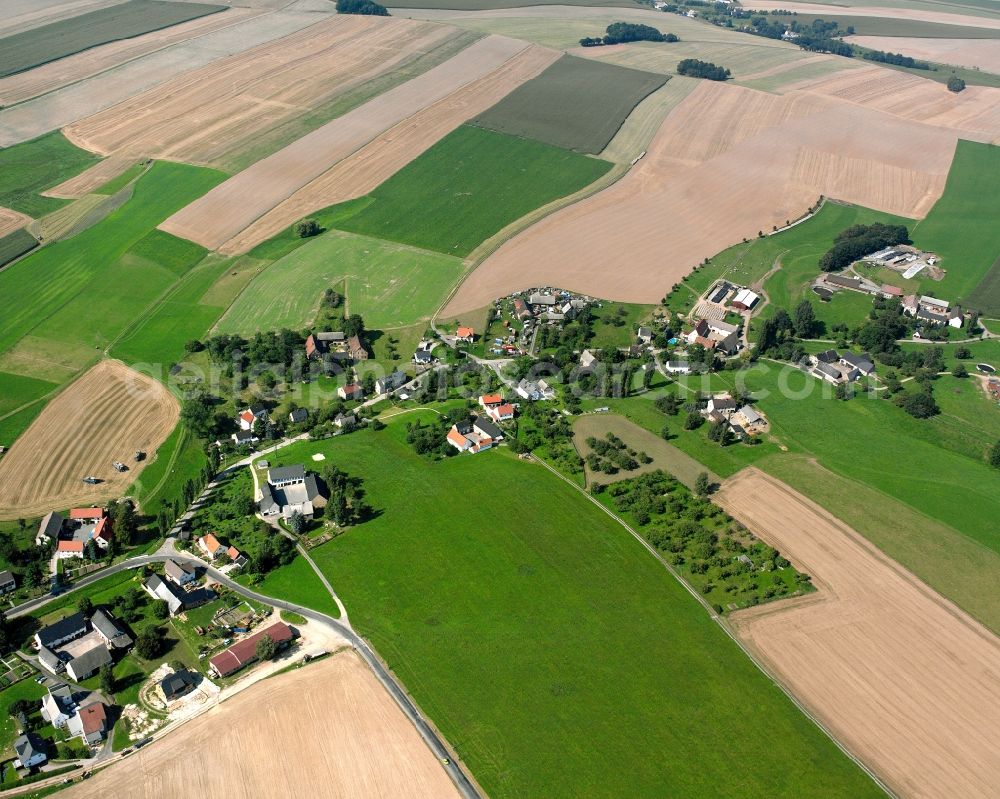 Langenleuba-Oberhain from above - Agricultural land and field boundaries surround the settlement area of the village in Langenleuba-Oberhain in the state Saxony, Germany