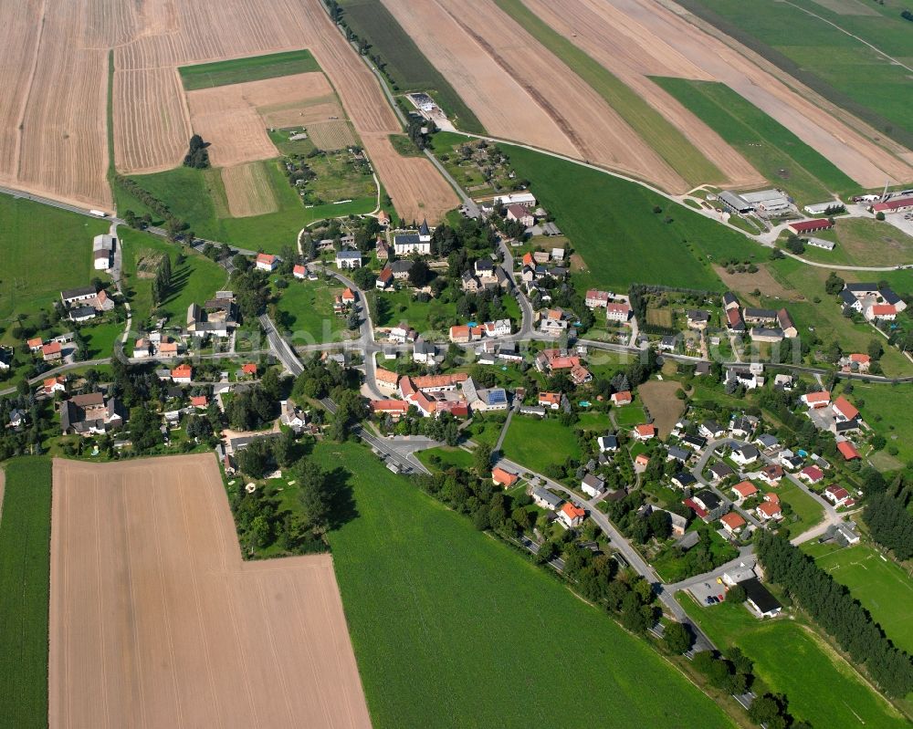 Langenleuba-Oberhain from above - Agricultural land and field boundaries surround the settlement area of the village in Langenleuba-Oberhain in the state Saxony, Germany