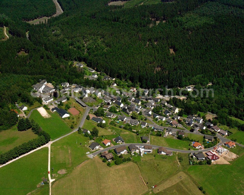 Aerial image Langweiler - Agricultural land and field boundaries surround the settlement area of the village in Langweiler in the state Rhineland-Palatinate, Germany