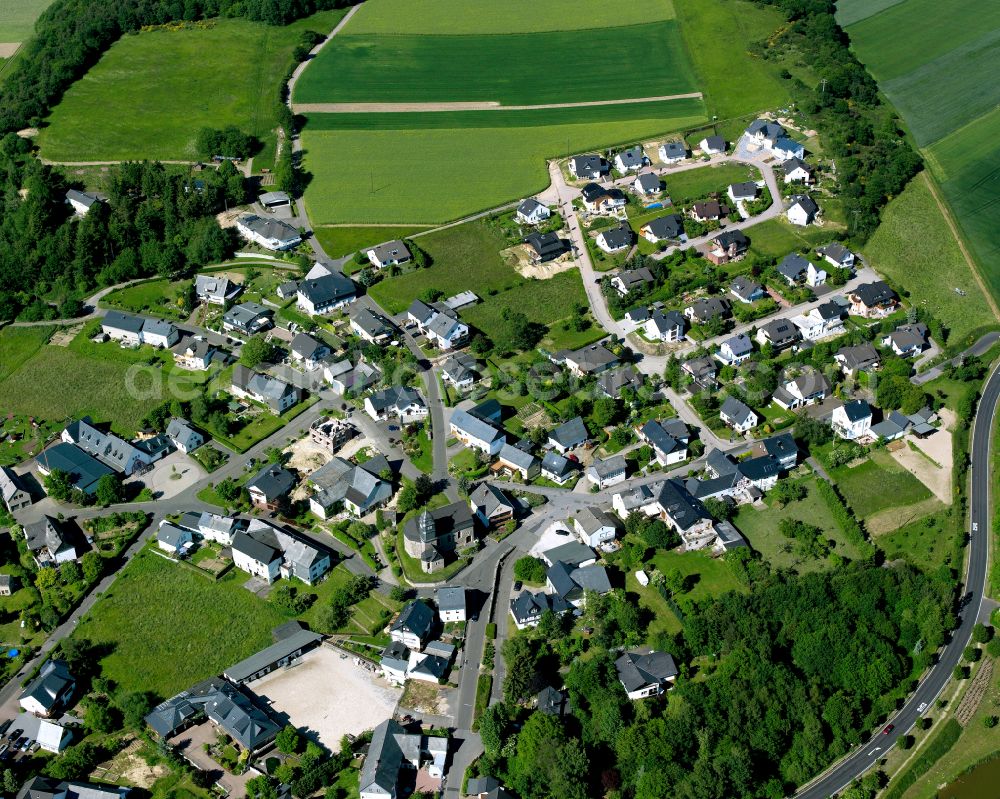 Aerial photograph Laudert - Agricultural land and field boundaries surround the settlement area of the village in Laudert in the state Rhineland-Palatinate, Germany