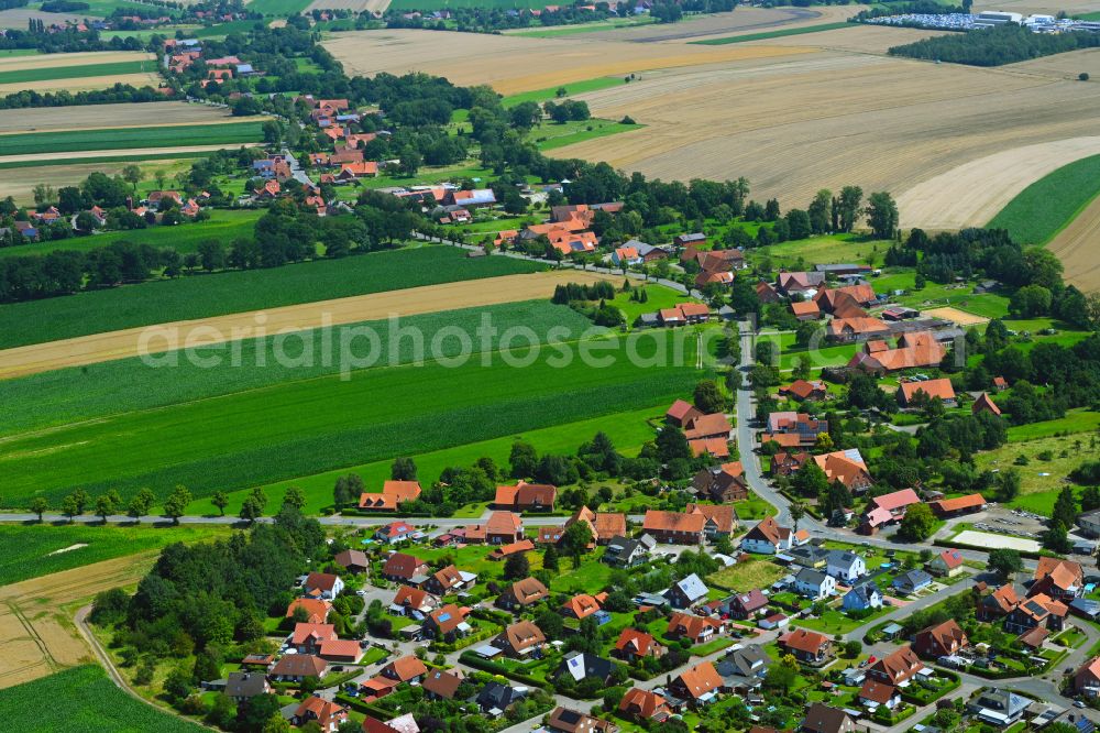 Aerial image Lauenhagen - Agricultural land and field boundaries surround the settlement area of the village in Lauenhagen in the state Lower Saxony, Germany