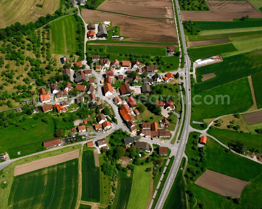 Lautern from the bird's eye view: Agricultural land and field boundaries surround the settlement area of the village in Lautern in the state Baden-Wuerttemberg, Germany