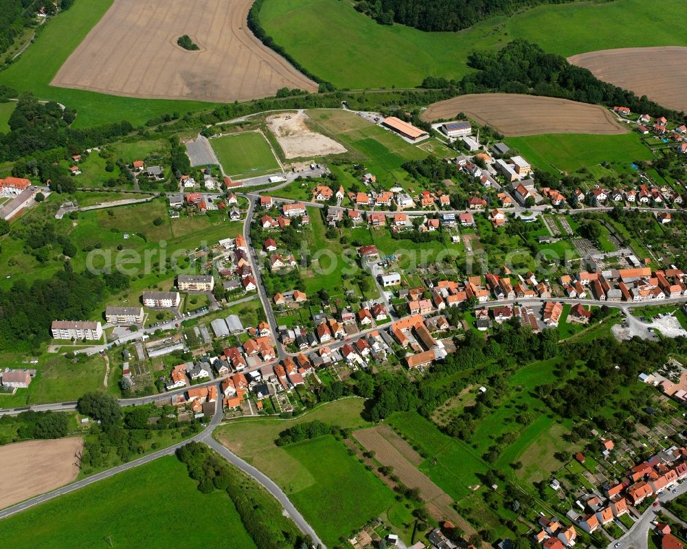 Lengenfeld unterm Stein from above - Agricultural land and field boundaries surround the settlement area of the village in Lengenfeld unterm Stein in the state Thuringia, Germany