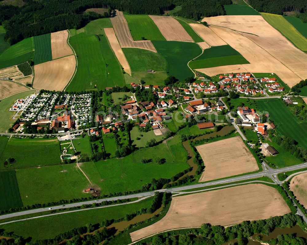 Lengham from the bird's eye view: Agricultural land and field boundaries surround the settlement area of the village in Lengham in the state Bavaria, Germany