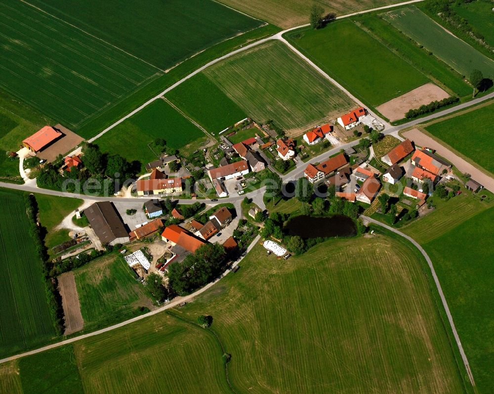 Aerial photograph Leutenbuch - Agricultural land and field boundaries surround the settlement area of the village in Leutenbuch in the state Bavaria, Germany