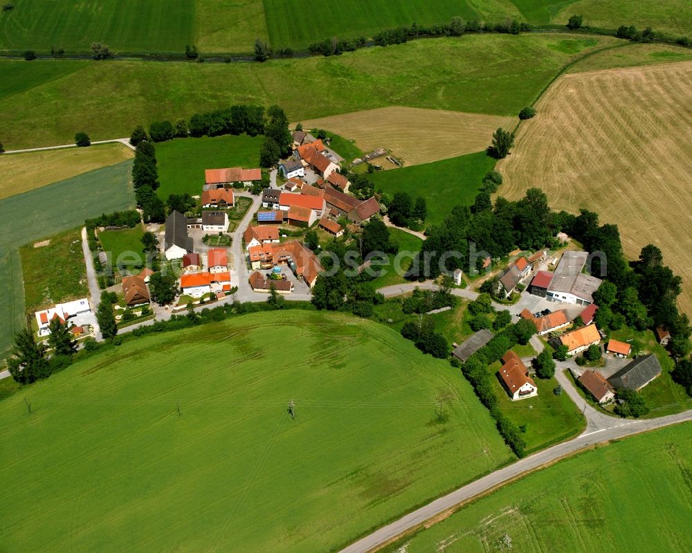 Leutenbuch from the bird's eye view: Agricultural land and field boundaries surround the settlement area of the village in Leutenbuch in the state Bavaria, Germany