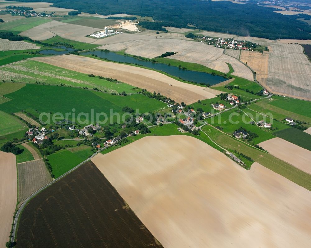 Aerial image Leutenhain - Agricultural land and field boundaries surround the settlement area of the village in Leutenhain in the state Saxony, Germany