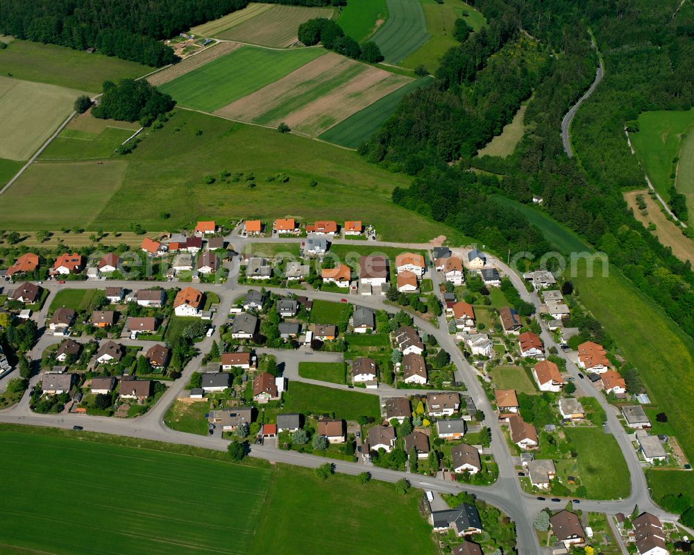 Aerial image Liebelsberg - Agricultural land and field boundaries surround the settlement area of the village in Liebelsberg in the state Baden-Wuerttemberg, Germany