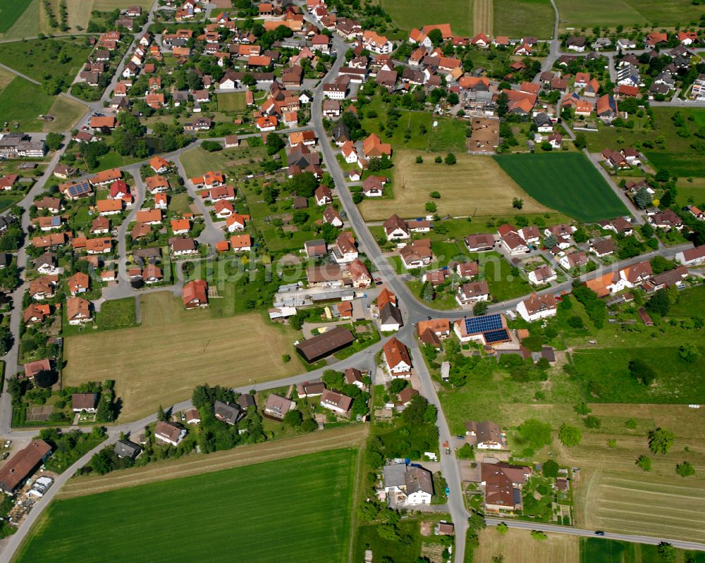 Aerial photograph Liebelsberg - Agricultural land and field boundaries surround the settlement area of the village in Liebelsberg in the state Baden-Wuerttemberg, Germany