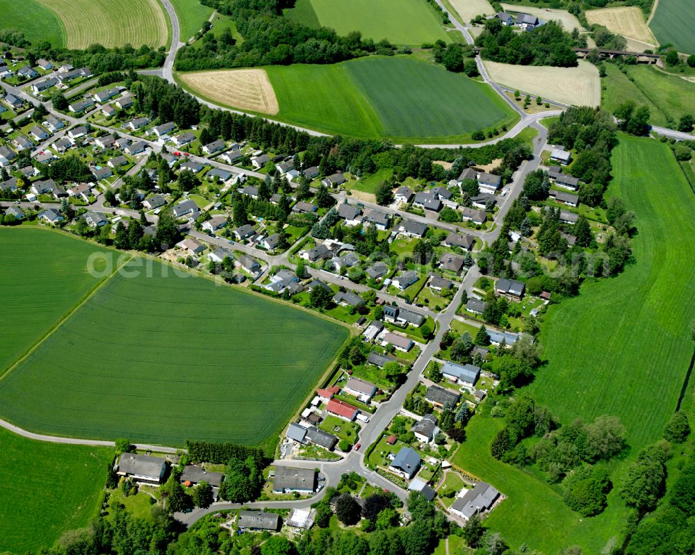 Aerial image Liederbach - Agricultural land and field boundaries surround the settlement area of the village in Liederbach in the state Rhineland-Palatinate, Germany