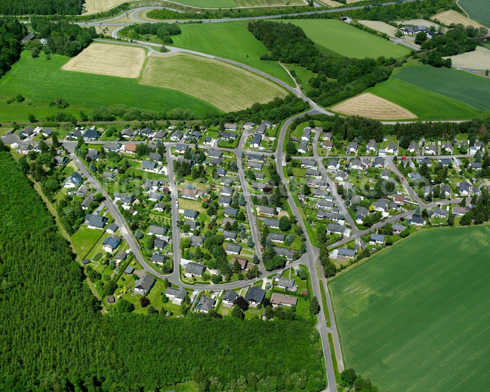 Aerial photograph Liederbach - Agricultural land and field boundaries surround the settlement area of the village in Liederbach in the state Rhineland-Palatinate, Germany