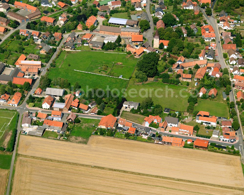 Lochtum from above - Agricultural land and field boundaries surround the settlement area of the village in Lochtum in the state Lower Saxony, Germany