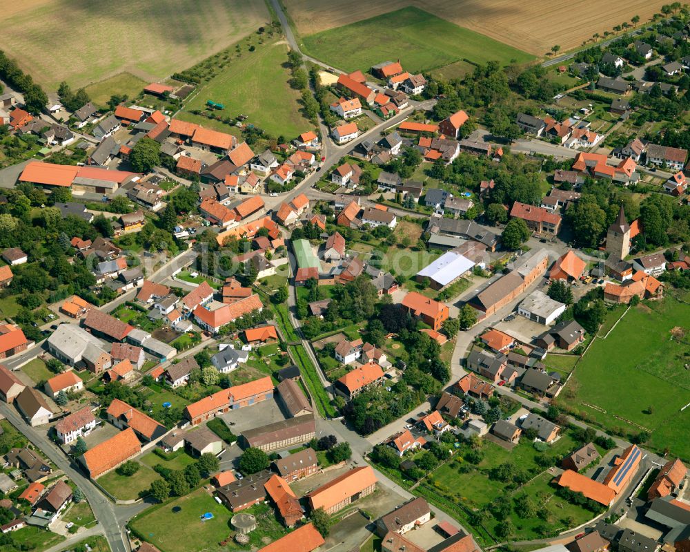 Lochtum from above - Agricultural land and field boundaries surround the settlement area of the village in Lochtum in the state Lower Saxony, Germany