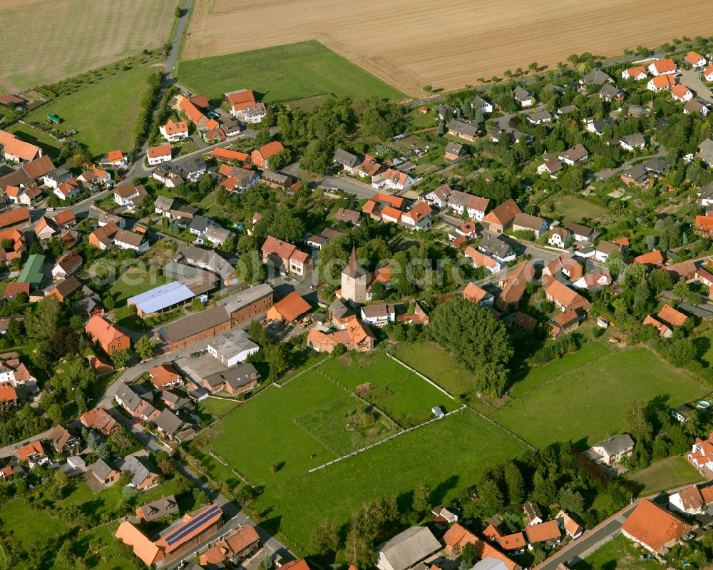 Lochtum from above - Agricultural land and field boundaries surround the settlement area of the village in Lochtum in the state Lower Saxony, Germany