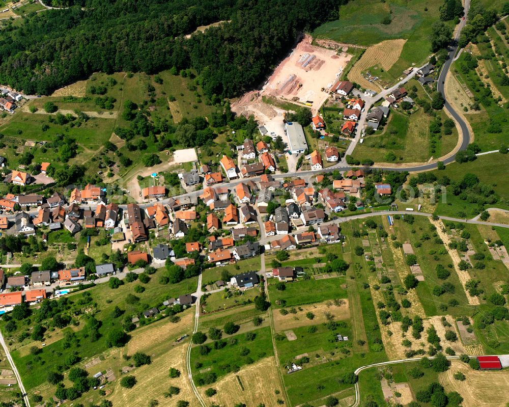 Aerial image Loffenau - Agricultural land and field boundaries surround the settlement area of the village in Loffenau in the state Baden-Wuerttemberg, Germany