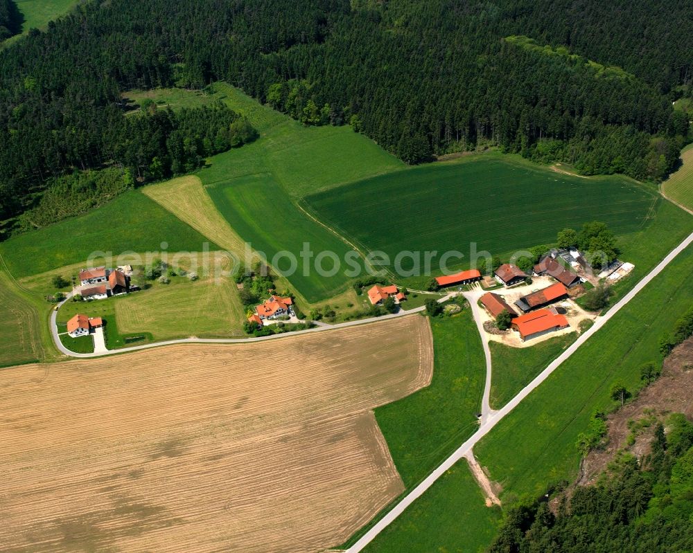 Aerial image Loh - Agricultural land and field boundaries surround the settlement area of the village in Loh in the state Bavaria, Germany