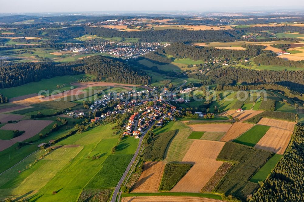 Lombach from the bird's eye view: Agricultural land and field boundaries surround the settlement area of the village in Lombach in the state Baden-Wuerttemberg, Germany