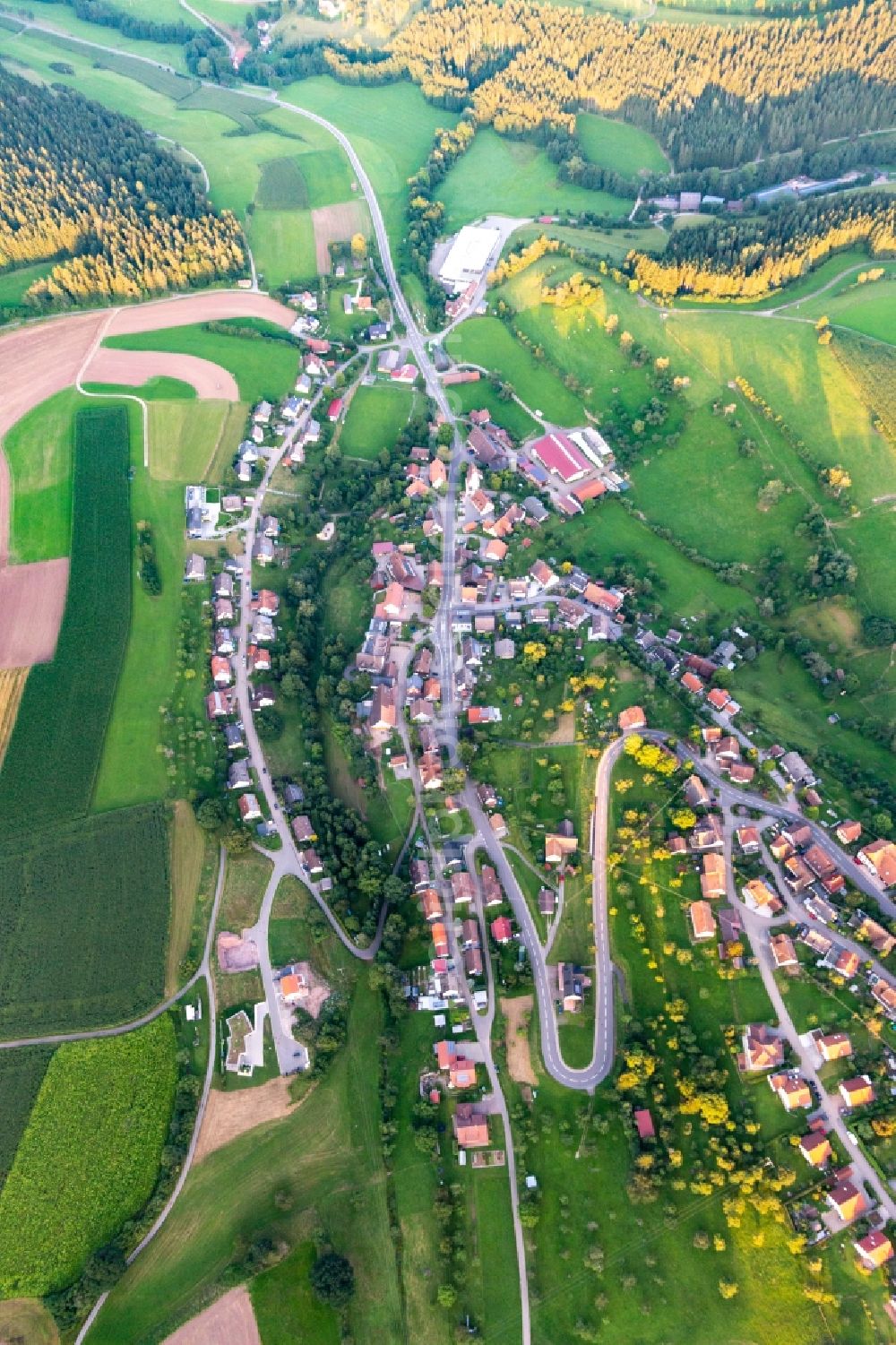 Aerial image Lombach - Agricultural land and field boundaries surround the settlement area of the village in Lombach in the state Baden-Wuerttemberg, Germany