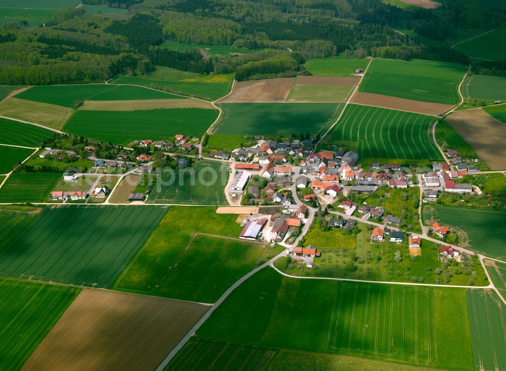 Lonsee from above - Agricultural land and field boundaries surround the settlement area of the village in Lonsee in the state Baden-Wuerttemberg, Germany