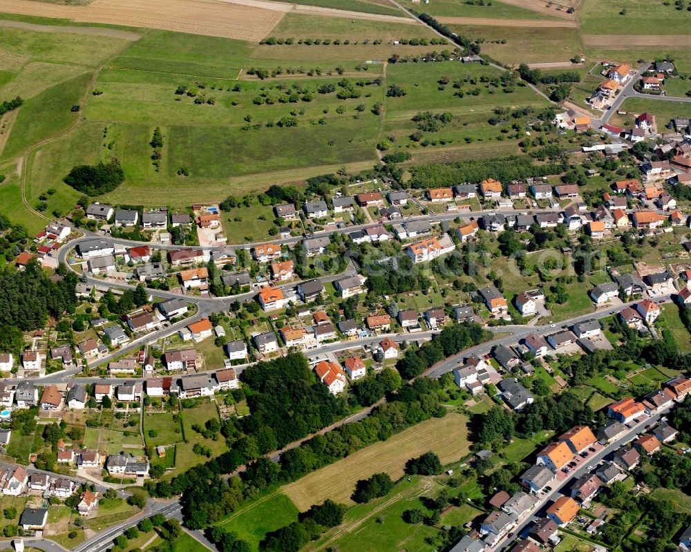 Aerial photograph Lützel-Wiebelsbach - Agricultural land and field boundaries surround the settlement area of the village in Lützel-Wiebelsbach in the state Hesse, Germany