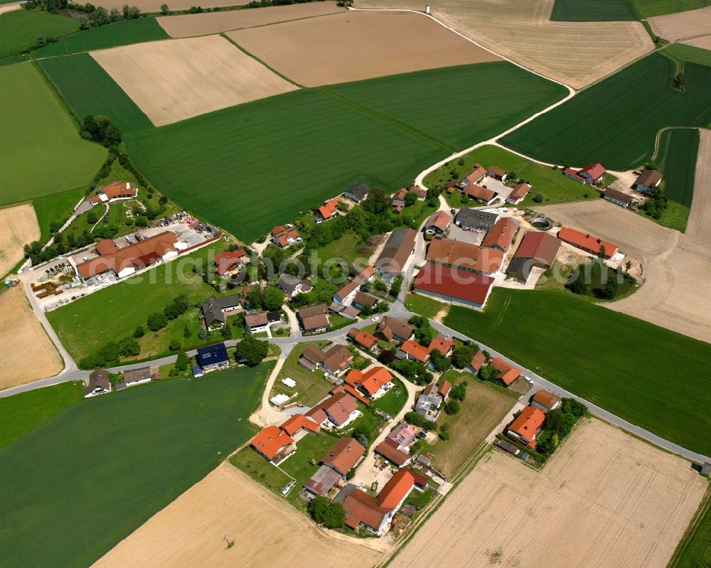 Malling from the bird's eye view: Agricultural land and field boundaries surround the settlement area of the village in Malling in the state Bavaria, Germany