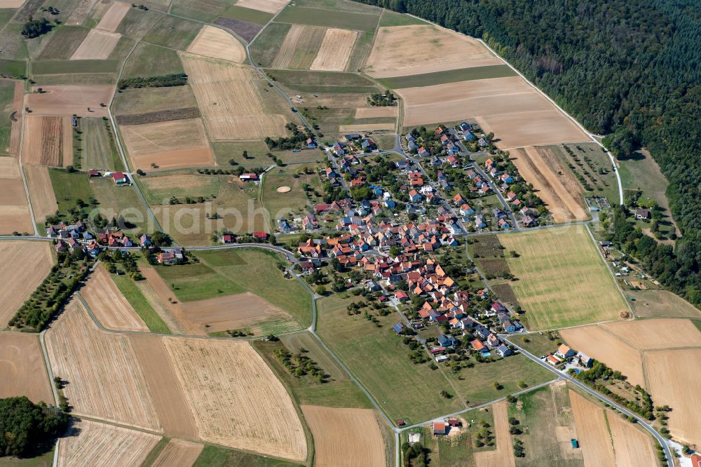 Aerial image Marienbrunn - Agricultural land and field boundaries surround the settlement area of the village in Marienbrunn in the state Bavaria, Germany