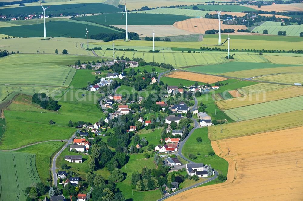 Markersdorf from above - Agricultural land and field boundaries surround the settlement area of the village in Markersdorf in the state Saxony, Germany