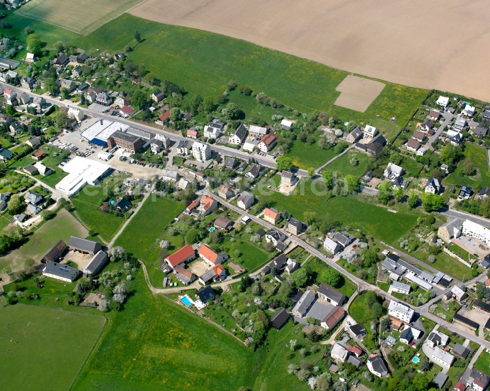 Aerial image Markersdorf - Agricultural land and field boundaries surround the settlement area of the village in Markersdorf in the state Saxony, Germany