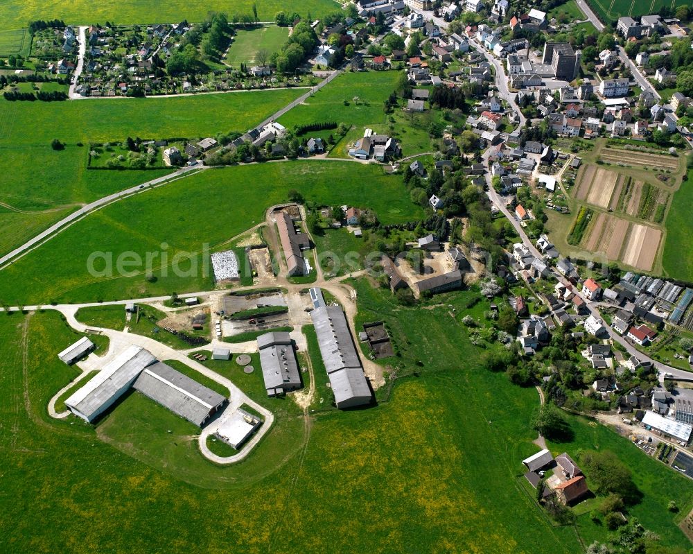 Markersdorf from the bird's eye view: Agricultural land and field boundaries surround the settlement area of the village in Markersdorf in the state Saxony, Germany