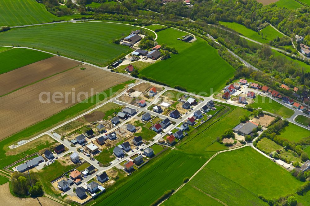 Aerial photograph Marktbreit - Agricultural land and field boundaries surround the settlement area of the village in Marktbreit in the state Bavaria, Germany