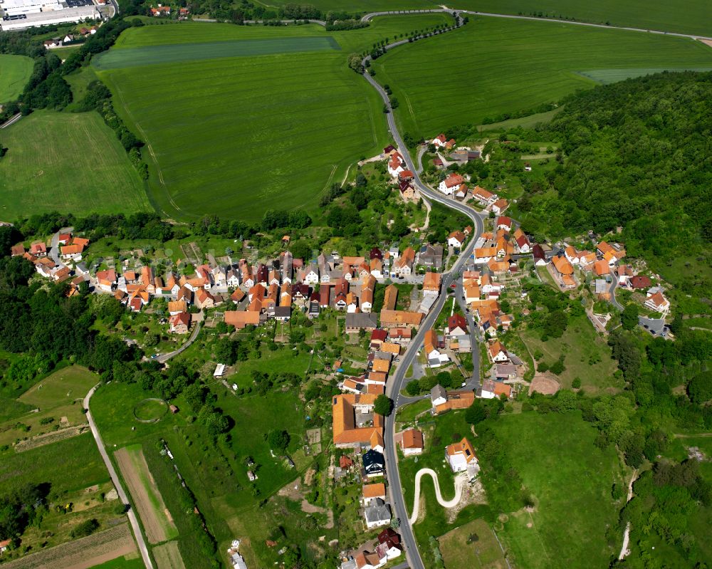 Marth from the bird's eye view: Agricultural land and field boundaries surround the settlement area of the village in Marth in the state Thuringia, Germany