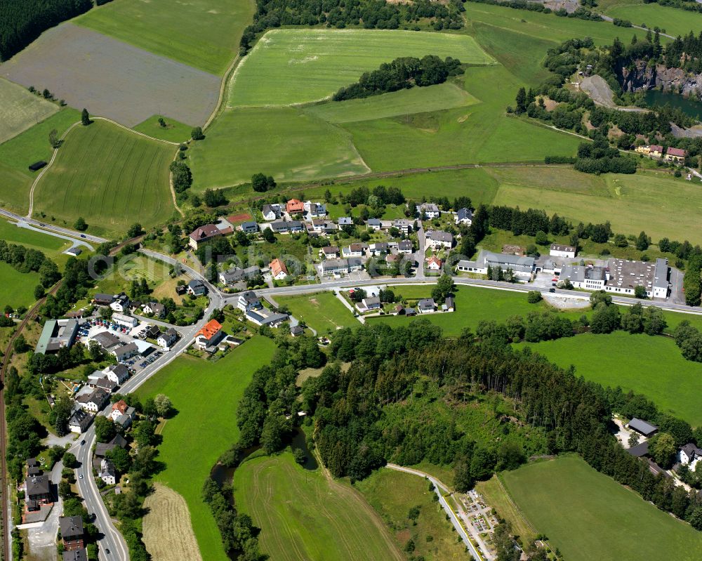 Marxgrün from the bird's eye view: Agricultural land and field boundaries surround the settlement area of the village in Marxgrün in the state Bavaria, Germany