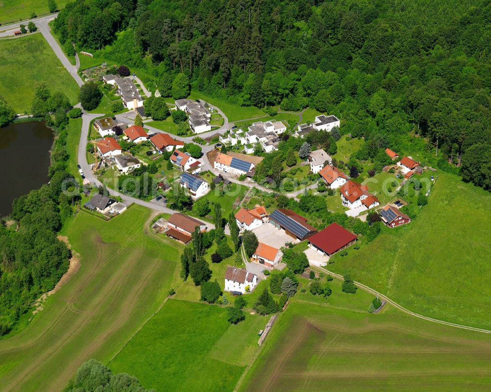 Maselheim from above - Agricultural land and field boundaries surround the settlement area of the village in Maselheim in the state Baden-Wuerttemberg, Germany