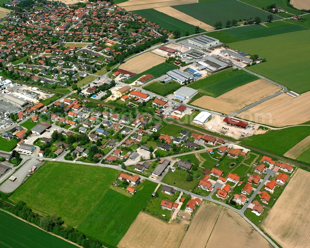 Massing from above - Agricultural land and field boundaries surround the settlement area of the village in Massing in the state Bavaria, Germany