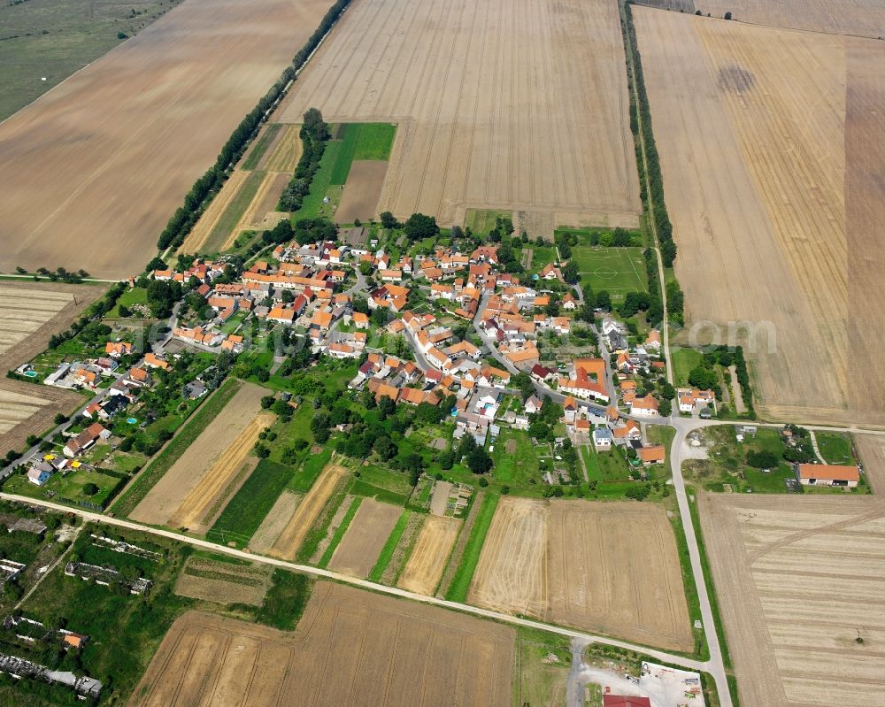 Aerial image Mehrstedt - Agricultural land and field boundaries surround the settlement area of the village in Mehrstedt in the state Thuringia, Germany