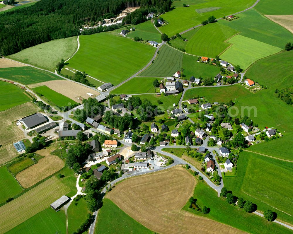 Aerial image Meierhof - Agricultural land and field boundaries surround the settlement area of the village in Meierhof in the state Bavaria, Germany