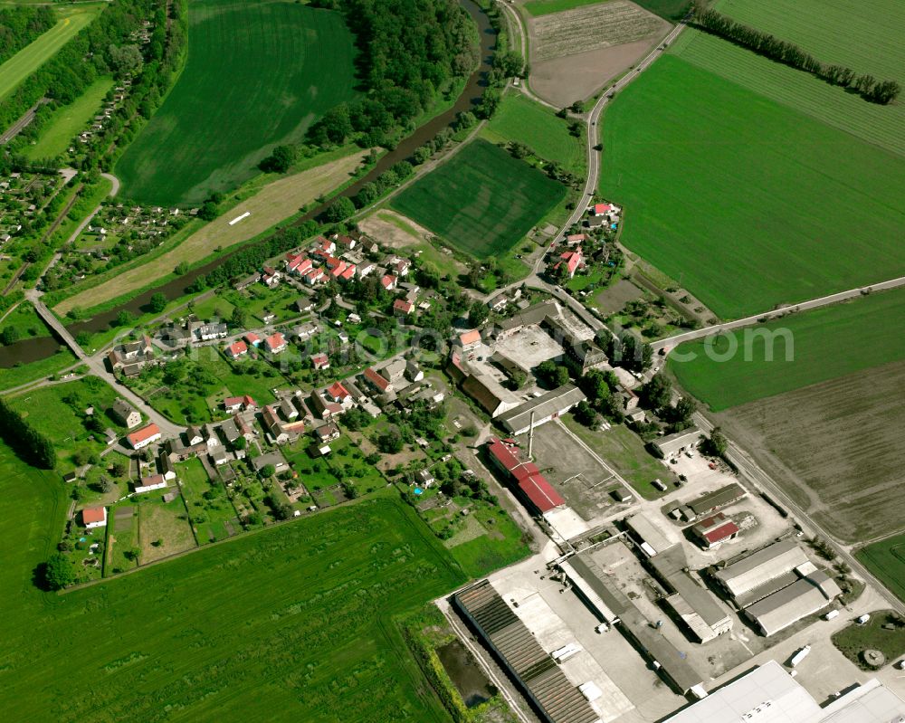 Aerial photograph Meilitz - Agricultural land and field boundaries surround the settlement area of the village in Meilitz in the state Thuringia, Germany