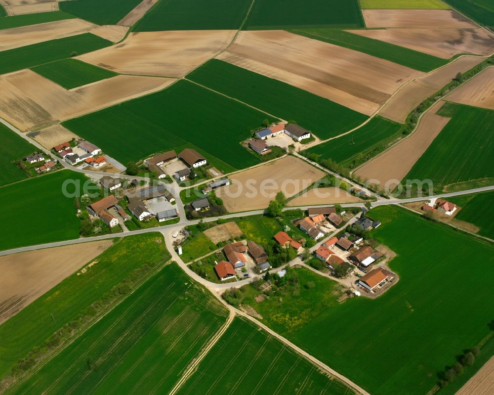 Meindling from above - Agricultural land and field boundaries surround the settlement area of the village in Meindling in the state Bavaria, Germany