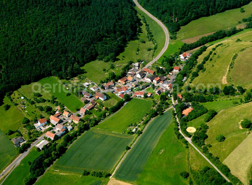 Messersbacherhof from above - Agricultural land and field boundaries surround the settlement area of the village in Messersbacherhof in the state Rhineland-Palatinate, Germany