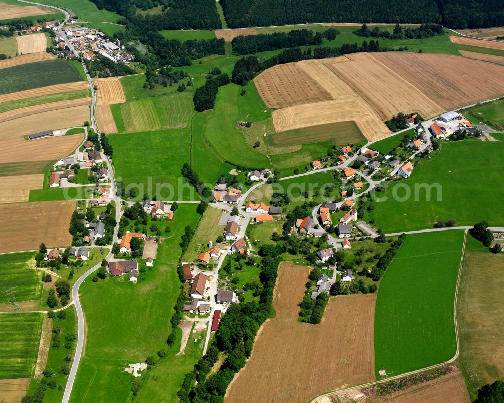 Aerial photograph Meßkirch - Agricultural land and field boundaries surround the settlement area of the village in Meßkirch in the state Baden-Wuerttemberg, Germany