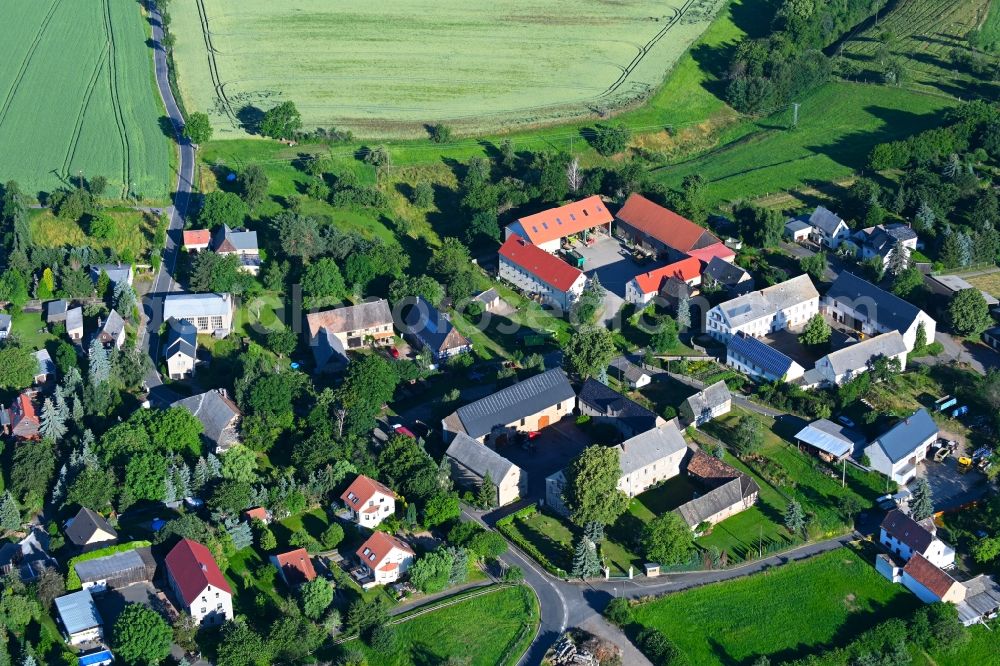 Aerial image Meuselwitz - Agricultural land and field boundaries surround the settlement area of the village in Meuselwitz in the state Saxony, Germany