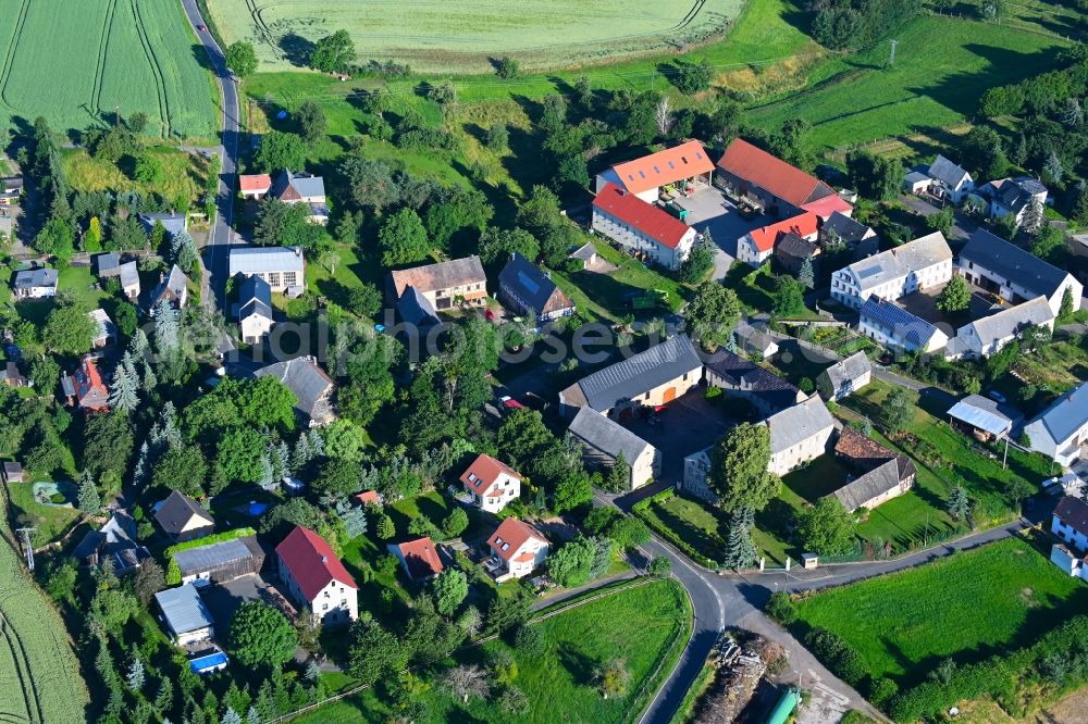 Meuselwitz from above - Agricultural land and field boundaries surround the settlement area of the village in Meuselwitz in the state Saxony, Germany