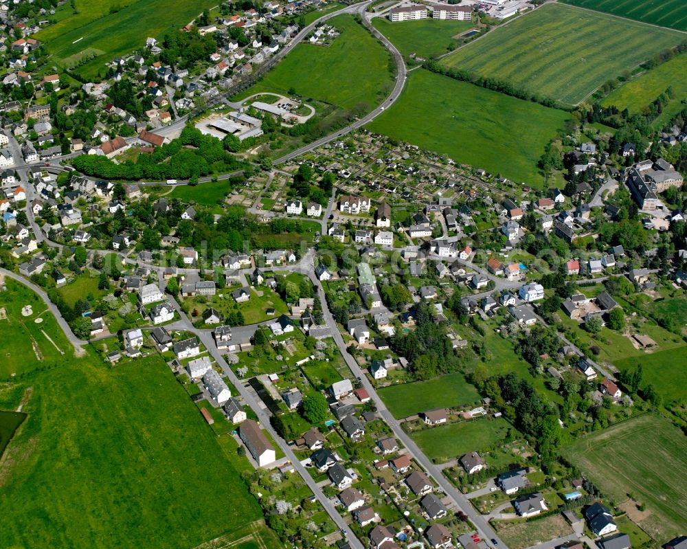 Aerial image Mühlau - Agricultural land and field boundaries surround the settlement area of the village in Mühlau in the state Saxony, Germany