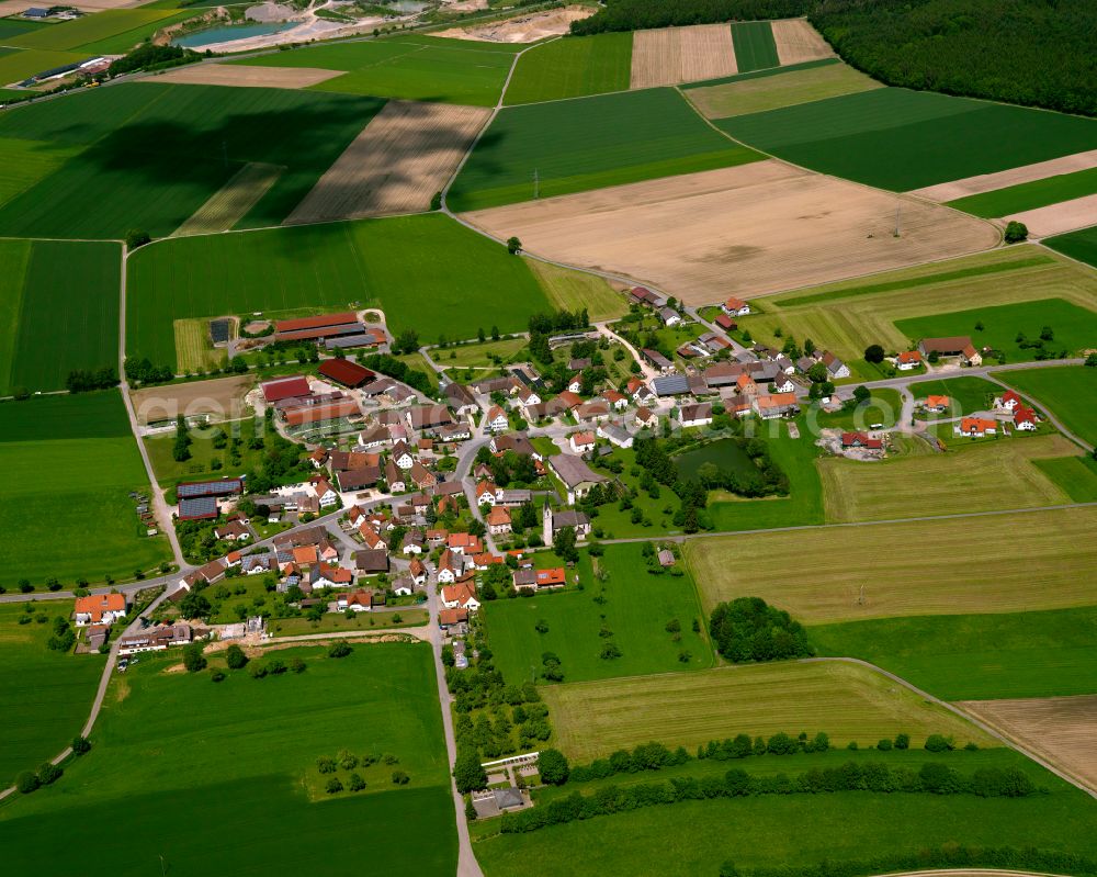 Aerial image Möhringen - Agricultural land and field boundaries surround the settlement area of the village in Möhringen in the state Baden-Wuerttemberg, Germany