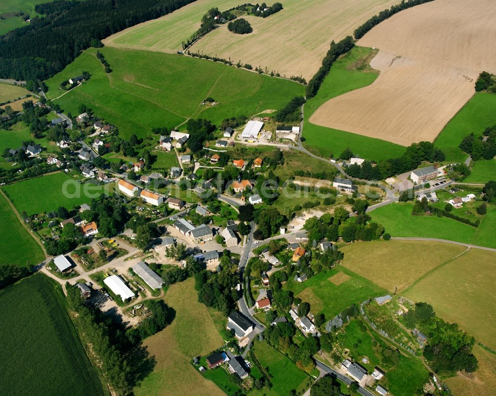 St. Michaelis from above - Agricultural land and field boundaries surround the settlement area of the village in St. Michaelis in the state Saxony, Germany