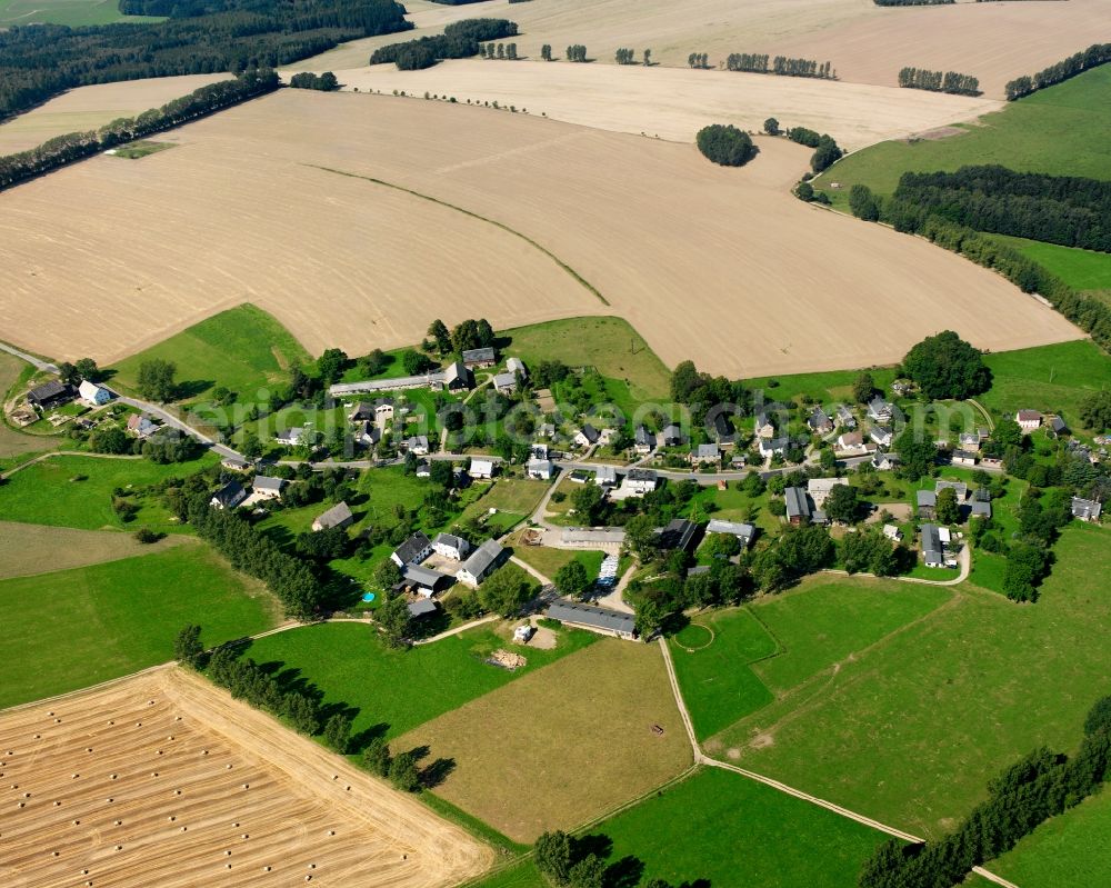 St. Michaelis from above - Agricultural land and field boundaries surround the settlement area of the village in St. Michaelis in the state Saxony, Germany