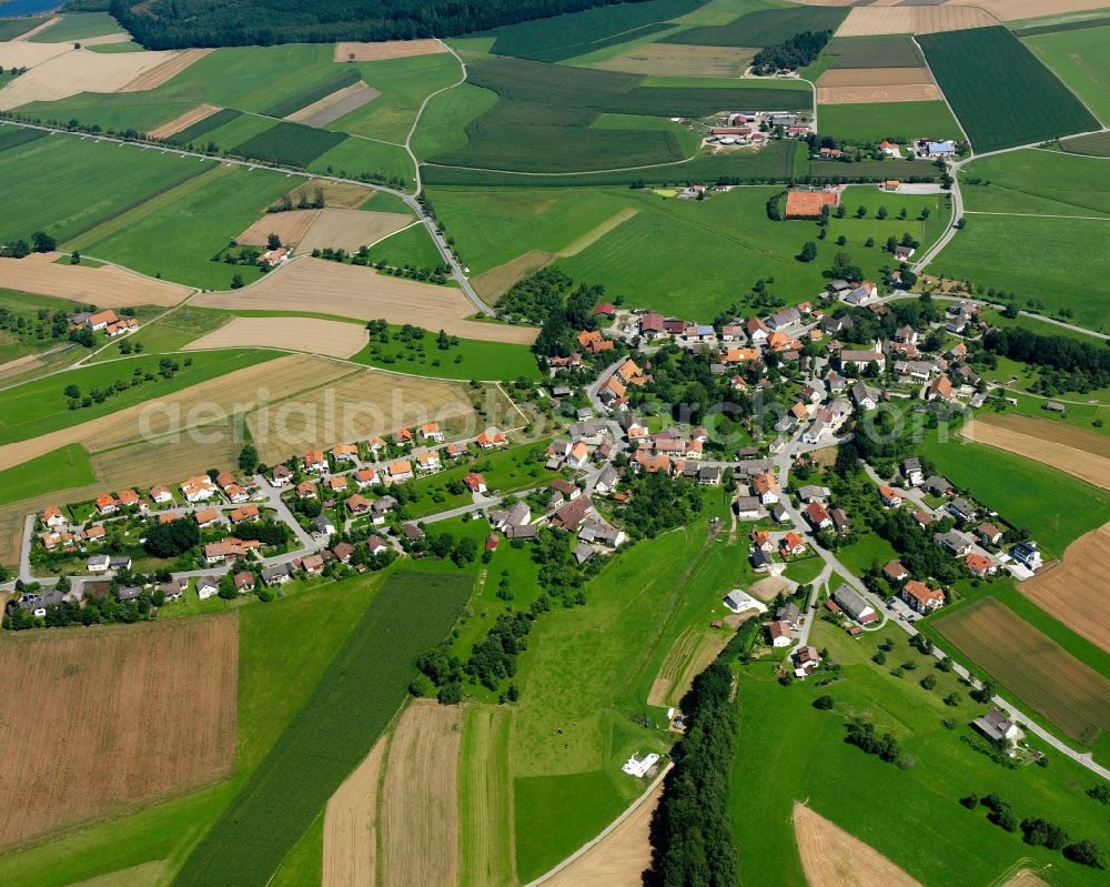 Aerial image Mindersdorf - Agricultural land and field boundaries surround the settlement area of the village in Mindersdorf in the state Baden-Wuerttemberg, Germany