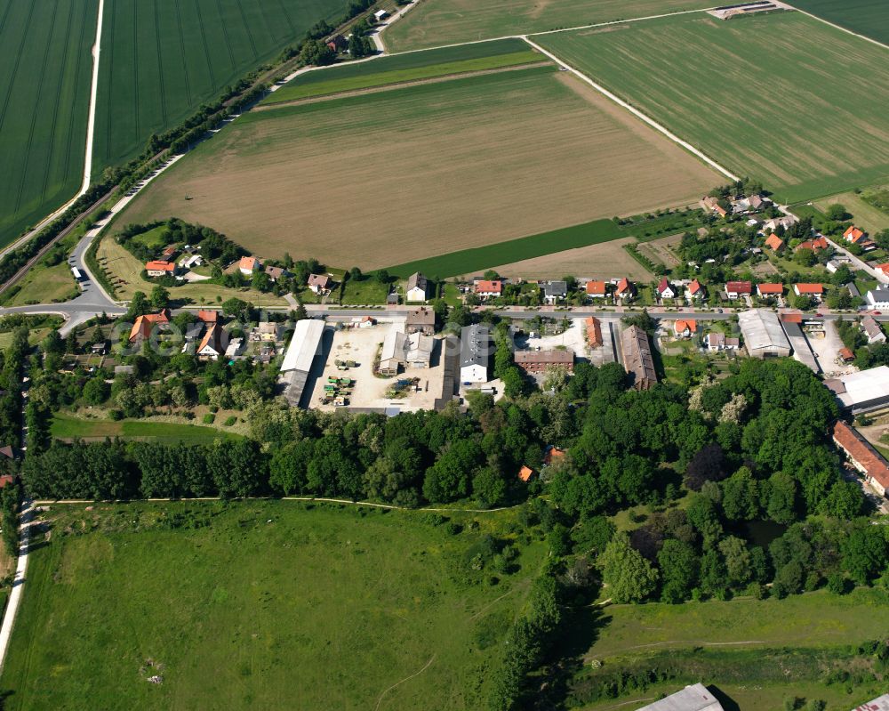 Aerial image Minsleben - Agricultural land and field boundaries surround the settlement area of the village in Minsleben in the state Saxony-Anhalt, Germany